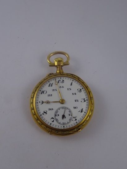 Montre de col en or jaune (750). 

Revers...