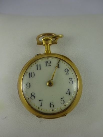 Montre de col en or jaune (750). 

Revers...