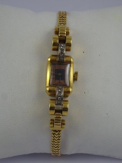 Montre bracelet de dame en or jaune (750)....