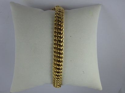 Bracelet gourmette en or jaune (750) à maille...