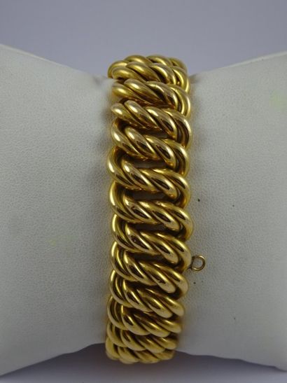 Bracelet gourmette en or jaune (750). Chaînette...