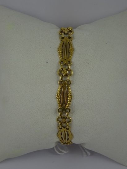 Bracelet articulé en or jaune (750) à maillons...