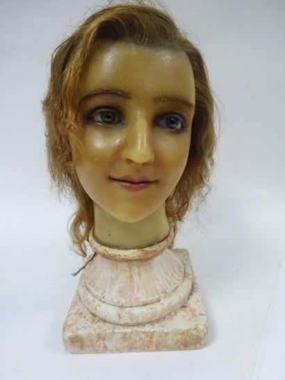 Tête de jeune femme en cire les yeux en verre,...