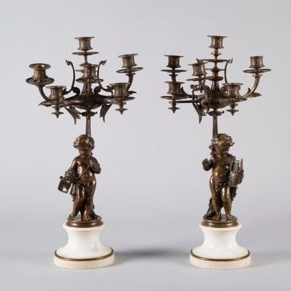 Paire de candélabres en bronze à patine brune...