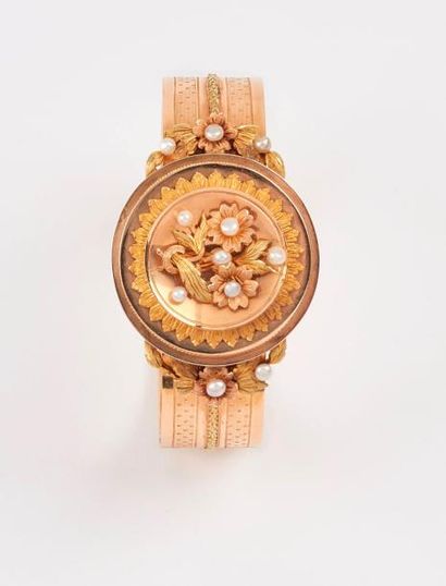 Bracelet rigide ouvrant en ors jaune et rose...