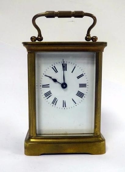 Pendulette de voyage à cage en laiton avec...