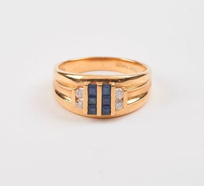 Bague en or jaune (750) ornée de deux lignes...
