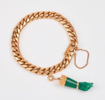 Bracelet en or jaune (750) à maille gourmette...