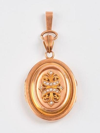Pendentif médaillon porte-photo en or jaune...