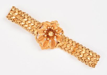 Bracelet articulé en or jaune (750) creux...