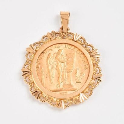 Pendentif en or jaune (750) retenant une...