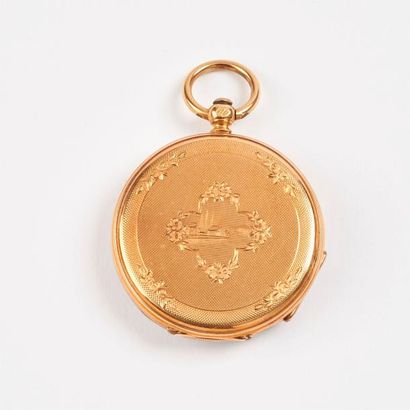 Grande montre de col en or jaune (750).

Cadran...