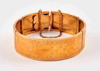 Bracelet articulé en or jaune (750) formé...