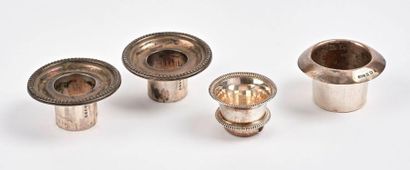 Quatre bobèches :

- trois en argent (800),...