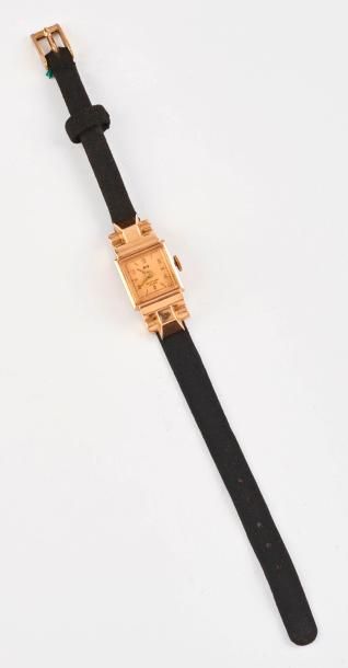 Montre bracelet de dame.

Boîtier en or jaune...