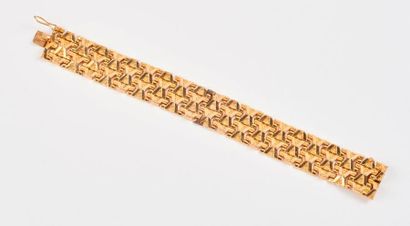 Bracelet articulé en or jaune (750) à maille...