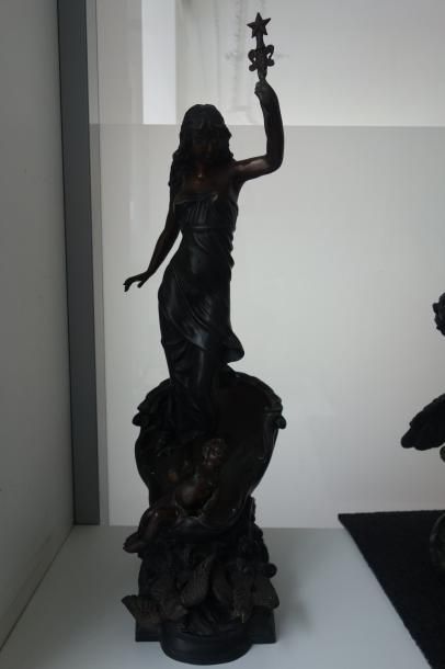 Femme drapée avec un amour guidant un char....