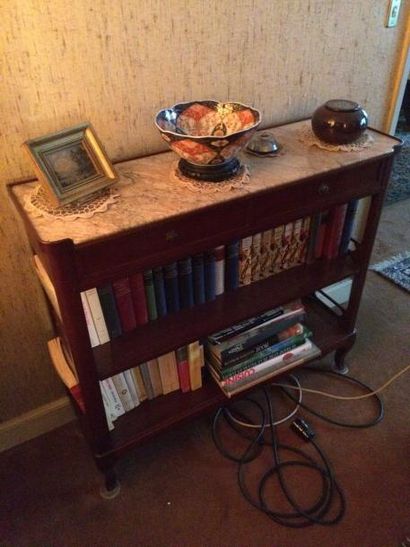 Meuble console en placage d'acajou, à deux...