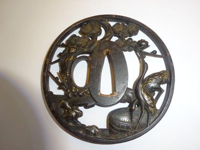 JAPON

Tsuba shin maru gata en alliage cuivreux...