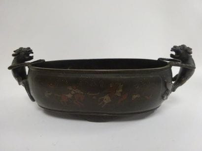 CHINE 

Jardinière en bronze à patine brune,...