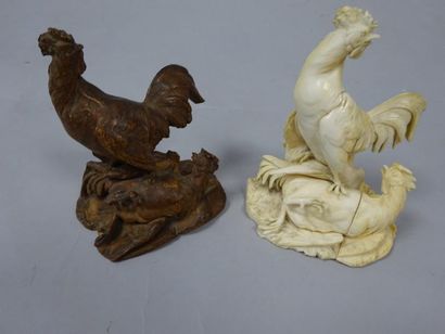 Combat de coqs.

Deux sujets sculptés, l'un...