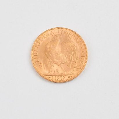 Pièce de 20 Francs en or, 1912. 

Poids :...