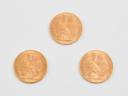 Lot de trois pièces de 20 Francs en or jaune,...