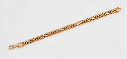 Bracelet articulé en ors (750) de deux tons...