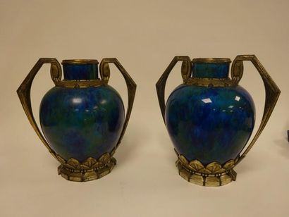 Paul MILET, SEVRES


Paire de vases en faïence...
