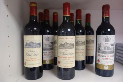 Ensemble de neuf bouteilles de vin:

- Chateau...