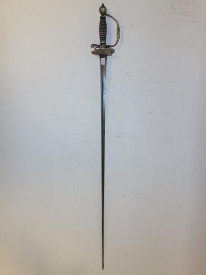 Epée de cour.

Garde à une branche en argent...