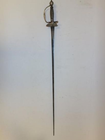 Epée de cour.

Garde à une branche en argent...
