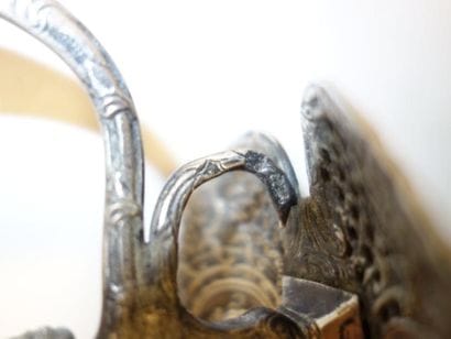 Epée de cour.

Garde à une branche en argent...