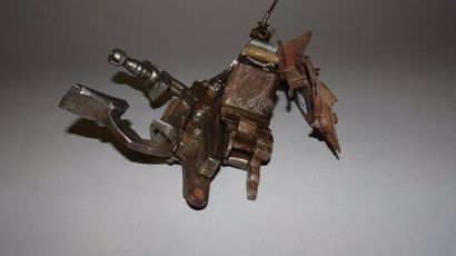 Trois platines :

- une de fusil à mèche.

Très...