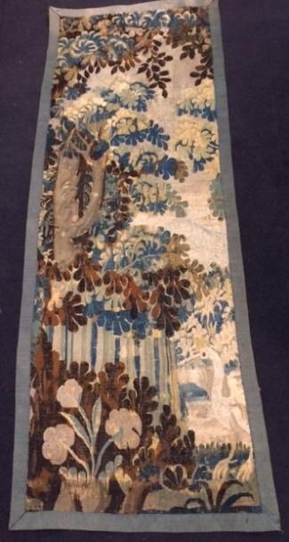 Arbres, fleurs et partie d'échassier.

Fragment...