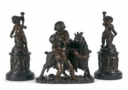 Groupe en bronze représentant des putti,...
