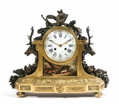 Importante pendule borne en bronze doré et...