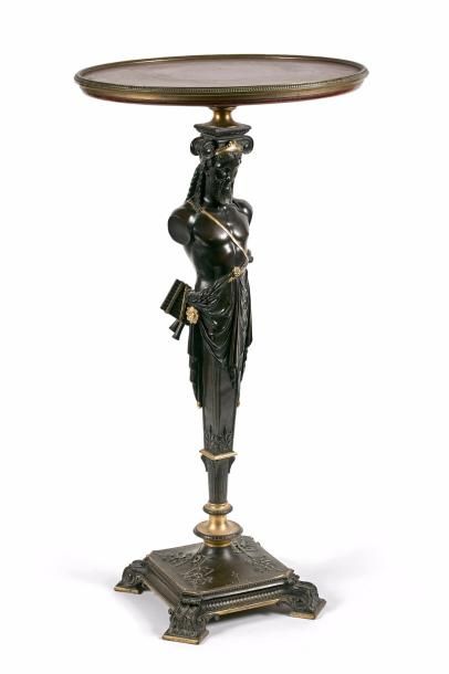 Guéridon à l'Antique.
Le fût en bronze à...