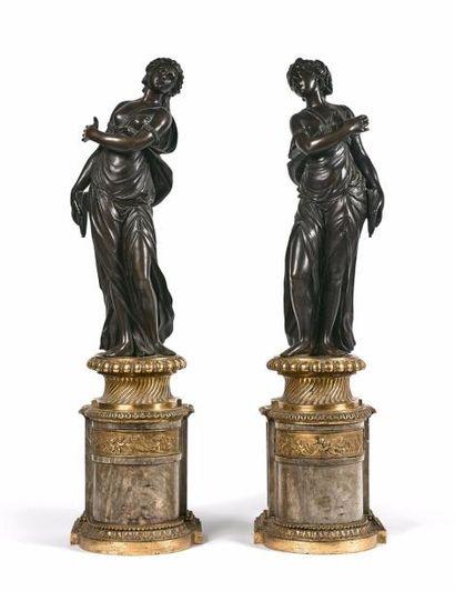 
Paire de supports de candélabres en bronze...