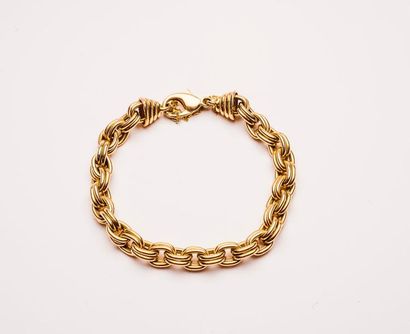 Bracelet en or jaune (750) à maille jaseron...