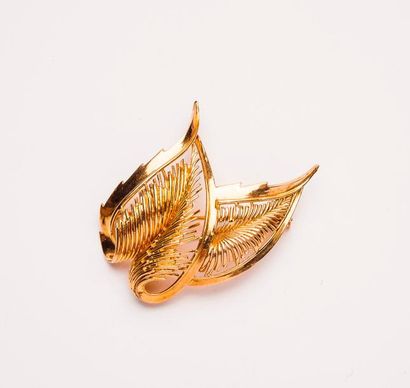 Broche deux feuilles en or jaune (750) ajouré.

Epingle...