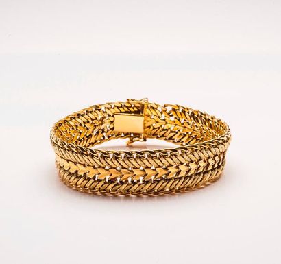 Bracelet articulé en or jaune (750) à maille...