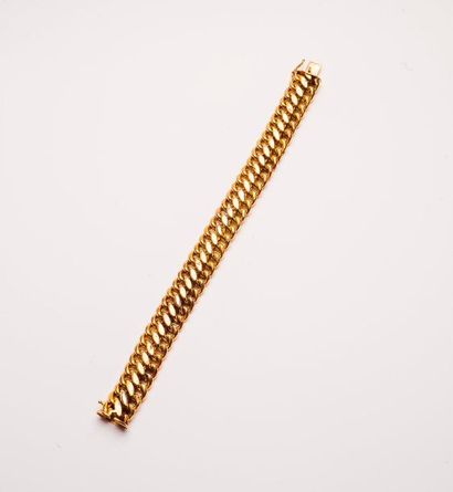 Bracelet à maille gourmette en or jaune (750).

Fermoir...