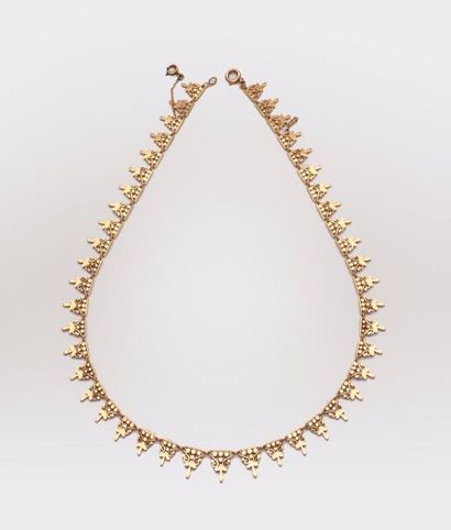 Collier draperie en or jaune (750) formé...