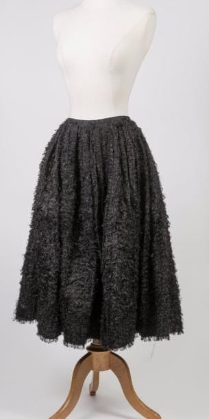 CHRISTIAN DIOR


Jupe midi en tissu noir...