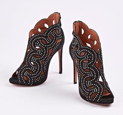 ALAÏA


Paire de sandales à haut talon en...