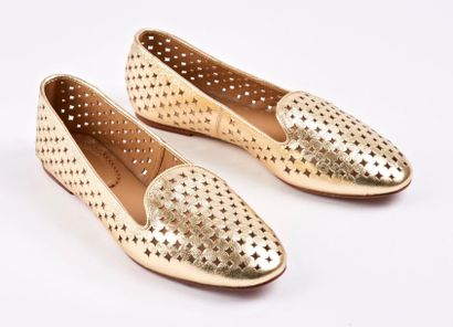 AQUAZURRA 


Paire de slippers en cuir doré...