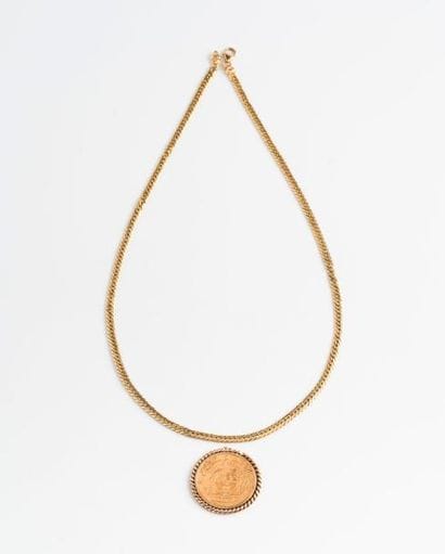 Débris de pendentif en or jaune (750) ornée...