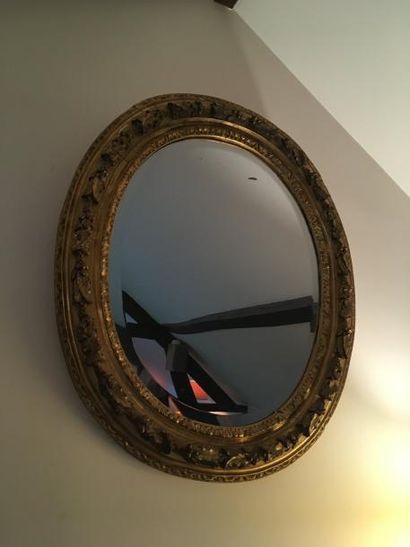 Miroir ovale à bord biseauté avec cadre en...