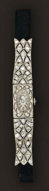 Bracelet-montre de dame en or gris à cadran...